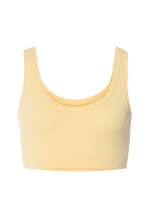 Světle žlutá sportovní podprsenka bez švů, krátká délka, s širokými ramenními popruhy a kulatým výstřihem na bílém pozadí.