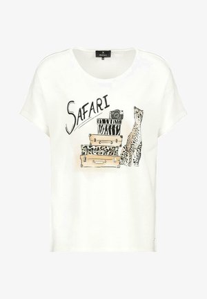 White short sleeve shirt with "SAFARI" text, stacked animal print suitcases, a camera, and a sitting cheetah illustration on front.