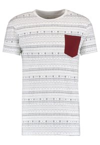 White short-sleeve t-shirt featuring a geometric pattern in navy, with a burgundy chest pocket. Cotton fabric, round neck design.