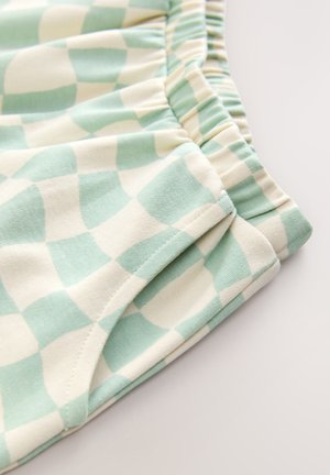 Letvægts shorts i let struktureret stof med ternet mintgrøn og cremefarvet mønster samt elastik i taljen for komfort.