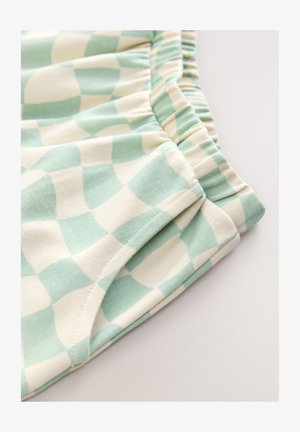 Letvægts shorts i let struktureret stof med ternet mintgrøn og cremefarvet mønster samt elastik i taljen for komfort.