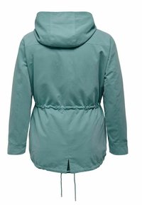 Šviesiai mėlynas kapučino tipo švarkas su susiaurinta juosmeniu, su raišteliais ir atvartiniu nugarėlės ventiliacijai. Lygaus audinio, laisvos formos.