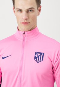Nike Performance ATLETICO MADRID NIKE DF STRIKE TRACKSUIT THIRD - Equipación de clubes - pink glow/blue void