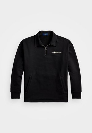 Svart tröja med kvartdragkedja, långa ärmar och sidofickor. Har en broderad "Polo Ralph Lauren"-logotyp på bröstet.