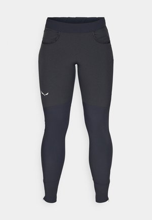 Leggings atletice negre din țesătură texturată, cu două buzunare laterale și un panou solid contrastant la partea inferioară a piciorului. Au fermoare la glezne.