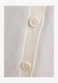 Sélectionné, off white