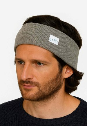 Grau gestricktes Stirnband mit strukturiertem Finish. Verfügt über ein kleines rechteckiges Logo-Patch. Designed für einen engen Sitz um den Kopf.