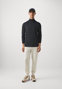 KARL LAGERFELD ROLL NECK - Strickpullover - black
