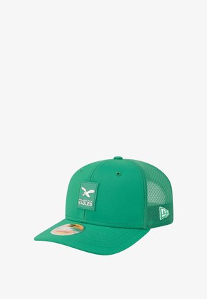 Green baseball cap with a mesh back, featuring a front patch of the Philadelphia Eagles logo and a rounded brim.