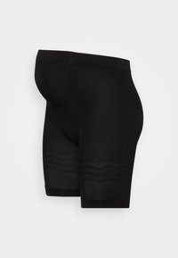 Calções de compressão pretos com uma textura suave, design de comprimento médio e padrões em zigue-zague discretos na bainha. Construção sem costuras.