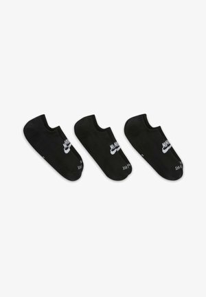 Sorte ankelstrømper med ribbet tekstur, prydet med et hvidt Nike-logo på hver side. Tre par vist, alle identiske i design.