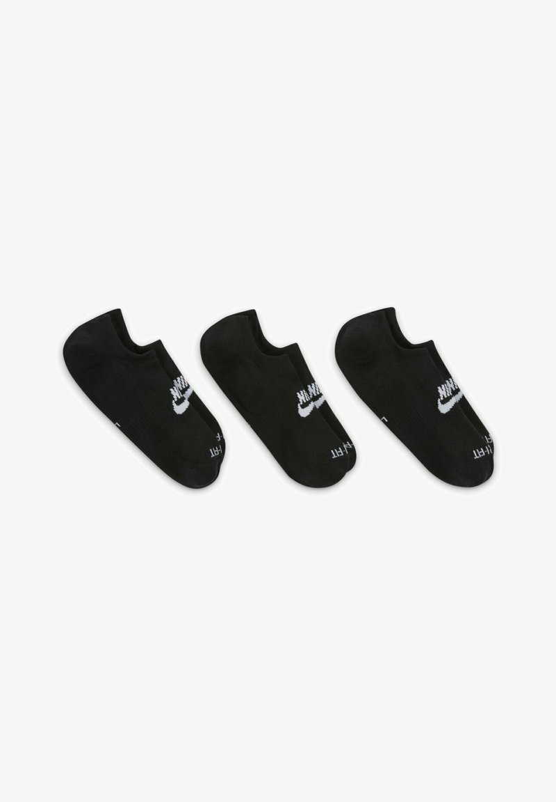 Černé kotníkové ponožky s žebrovanou texturou, se bílým logem Nike na každé straně. Zobrazeny tři páry, všechny identické v designu.