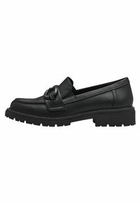 Black leather loafers with a wide strap and circular hardware detail. Textured upper, chunky rubber sole with tread design.