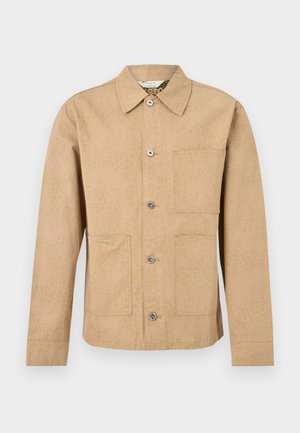 Helepruun, nööpidega särkjakk pikkade varrukatega, kolme eest taskuga ja peene tekstuuriga mustriga.