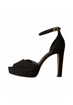 Black high-heeled sandal with ankle strap, gold buckle, peep toe, and platform sole on white background.