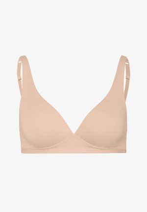 Jasnobeżowy biustonosz wykonany z gładkiego materiału; trójkątne miseczki, szerokie ramiączka i brak fiszbin. Prosty design z bezszwowym wykończeniem.