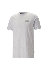 Camiseta de manga corta gris hecha de algodón, con cuello en ronda y un pequeño logo negro de "PUMA" en el área del lado izquierdo del pecho.