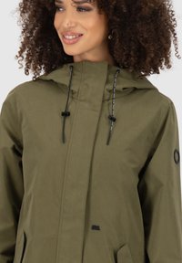 alife & kickin Regenjas - dark olive