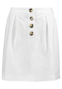 Valkoinen hame, joka on tehty teksturoidusta kankaasta ja jossa on etupellava sekä neljä pyöreää, erottuvaa ruskeaa nappia keskellä.