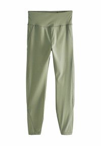 Olívazöld leggings, széles derékrésszel, sima, rugalmas anyagból készültek. Lapított varrásokkal és keskenyített bokával rendelkeznek.