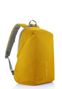 Yellow backpack made of textured fabric with gray padded straps. Features a minimalist design and a reflective accent on the front.