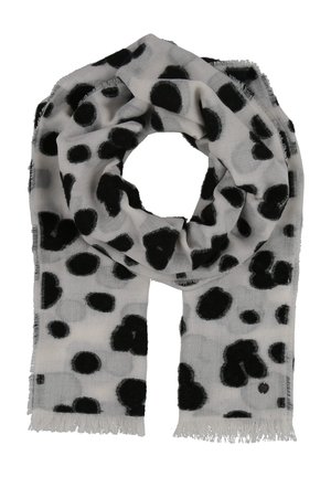 Écharpe gris clair avec des pois noirs irréguliers et des bords à franges, pliée en forme de boucle sur un fond blanc.