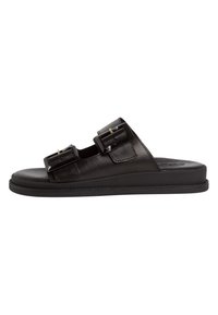 Black leather slide sandal featuring two large, rectangular buckles, a flat sole, and a smooth texture with minimal design details.