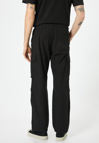 Koton POCKET PARACHUTE  - Cargobyxor - black