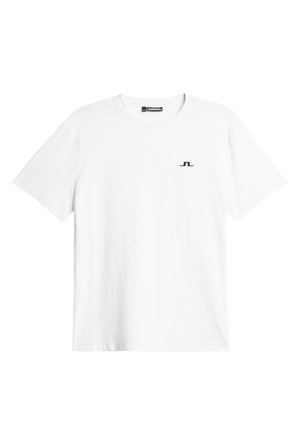 Weißes Baumwoll-T-Shirt mit kurzen Ärmeln, Rundhalsausschnitt und einem kleinen schwarzen Logo auf der linken Brust. Glatte Textur, normale Passform.