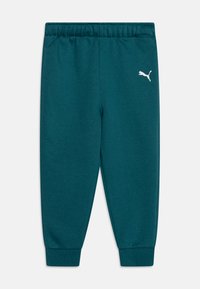 Pantalones de chándal azul verdoso con cinturilla elástica, piernas ajustadas y puños acanalados. Presenta un pequeño logo blanco de Puma en la cadera izquierda.