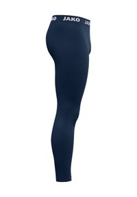 Marineblauwe leggings met een gladde, rekbare textuur en een elastische tailleband met de merktekst "JAKO" in het wit.