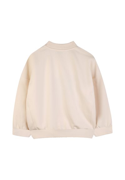 Lysebeige pulloverjakke med afslappet pasform, ribbet krave og manchetter samt glat tekstur. Bagsiden har et enkelt design uden pynt.