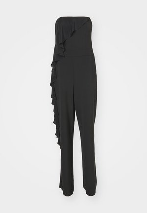Mono negro sin tirantes con un detalle de volantes a lo largo de un lado, que presenta un corsé ajustado y pantalones de pierna ancha hechos de una tela suave.