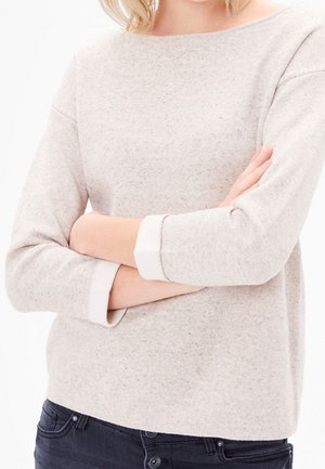 Stickad tröja - beige