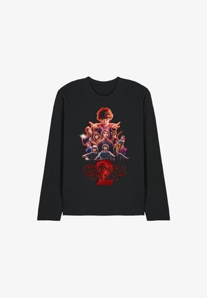 Black long-sleeve t-shirt featuring "Stranger Things 2" graphic, showcasing characters in vibrant colors against a dark background.
