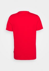 Rød crew-neck t-shirt i bomuldsstof med korte ærmer, lige snit og en ensfarvet bagside uden udsmykninger.