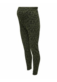 Leopardprint legging in donkergroen en zwart. Elastische tailleband, aansluitend ontwerp, zachte textuur en taps toelopende pijpen.