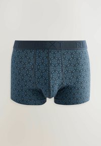 Navy blue boxer briefs with a geometric pattern in light blue. Elastic waistband with "NEXT" branding. Soft, stretchy fabric.