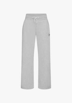 Pantalones de chándal grises con cintura elástica ajustable, corte holgado y detalle de logo en el lateral. Fabricados con un tejido suave y texturizado.