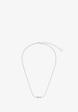 Collier en argent avec une rangée unique de petites pierres transparentes, doté d'un fermoir sécurisé et d'une chaîne ajustable pour varier la longueur.