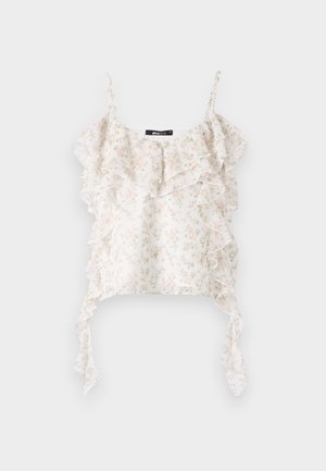 Hvit blomstret cami-top med tynne stropper, med lagdelte volanger langs brystet og knytinger i sidene, laget av lett stoff.