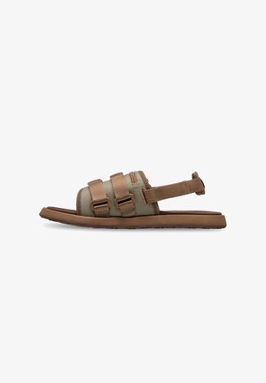 Vue latérale d'une sandale marron avec deux brides réglables sur le dessus, une bride au talon et une semelle plate.