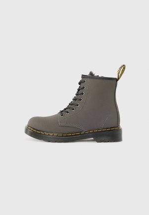 Gray leather ankle boot with black laces, yellow stitching, and a pull tab. Features a round toe and textured rubber sole for traction.