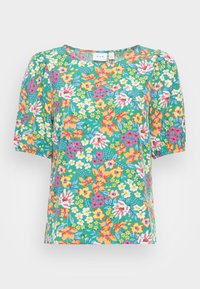 Top à manches courtes floral en teal, orné de fleurs vives orange, rose et blanches. Tissu léger avec une coupe décontractée et un col rond.