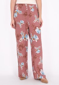 Blumenmusterweite Hosen in einem staubigen Rosaton, mit blauen und braunen Blumen. Hergestellt aus leichtem Stoff mit einem elastischen Bund.
