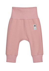 Lichtroze babybroekjes met een geribde tailleband en boorden, voorzien van een klein label met tekst. Zachte stof en een comfortabele pasvorm.
