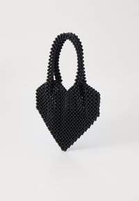 Black beaded handbag with a heart shape, featuring two rounded handles and a textured surface created by small glossy beads.