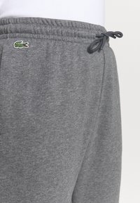 Lacoste Sport Teplákové kalhoty - grey
