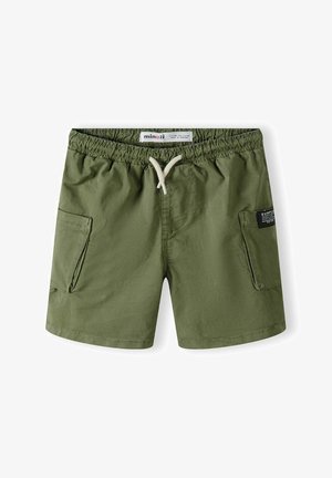 Olíva zöld fürdőnadrág rugalmas derékpánttal, húzózsinórral és két oldalsó zsebbel. Puha tapintású, matt felület.