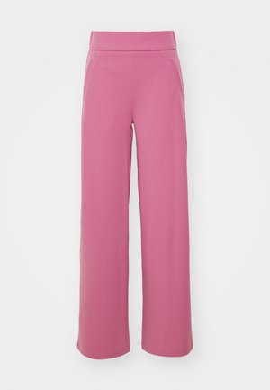 Schwarzbeinige Hose in einem einheitlichen Pinkton. Hergestellt aus einem glatten Stoff mit einem elastischen Bund und seitlichen Taschen. Keine sichtbaren Muster oder Beschläge.